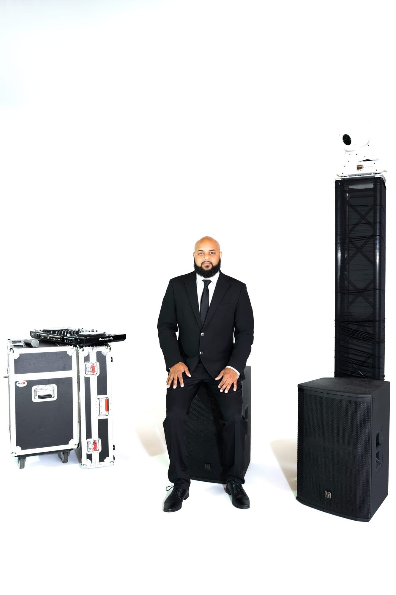 SB Mega Events DJ with road cases and speaker tower